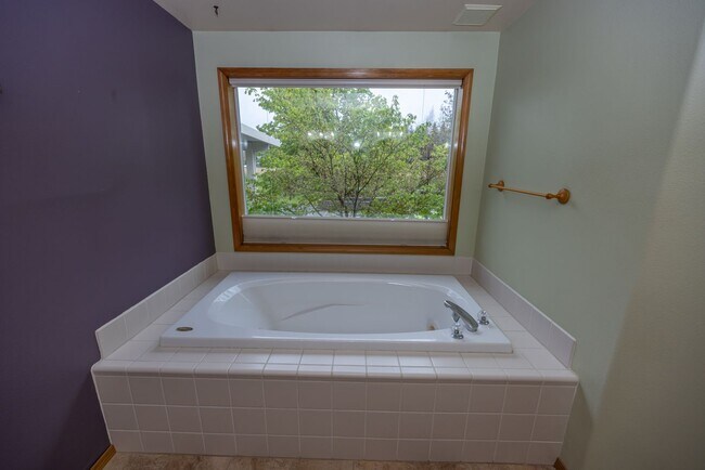 Building Photo - One Level Home - Three Bedroom + Bonus with AC / Beautiful Yard!