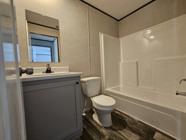 Building Photo - 6711 Hidden Oaks Dr