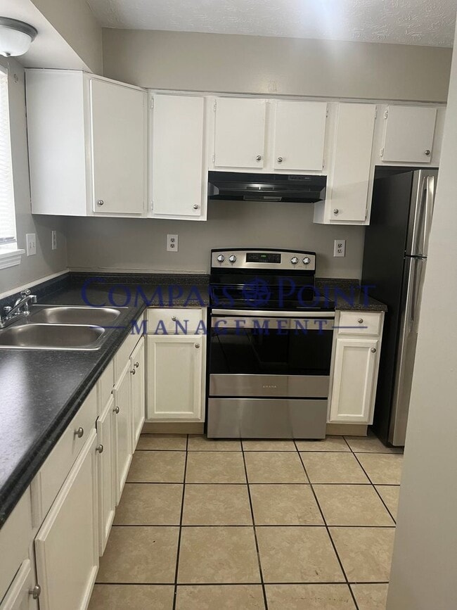 Building Photo - Your New 2 Story- Duplex Awaits!