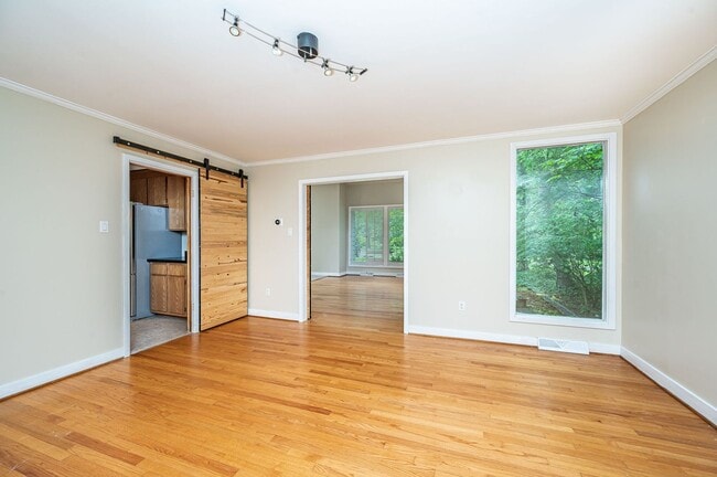 Building Photo - Exceptional Contemporary Features Privacy and a Scenic Back Yard.