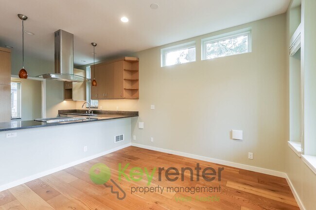 Building Photo - Modern Seattle Home Featuring Hardwood Floors and Style