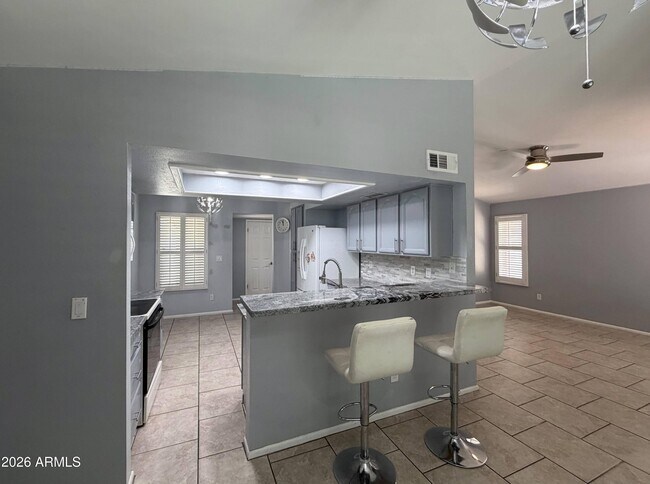 Building Photo - 11815 N 65th Dr
