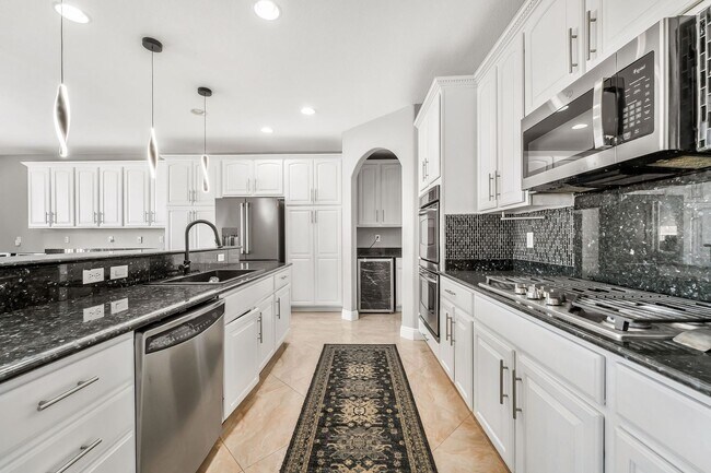 Building Photo - Fully Furnished Luxury Living with Expansive, Move-In Ready Comfort!