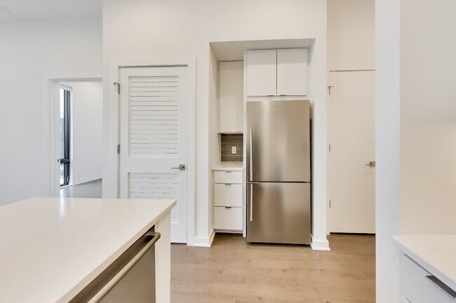 Building Photo - Top floor residence in elevator building with sweeping views.