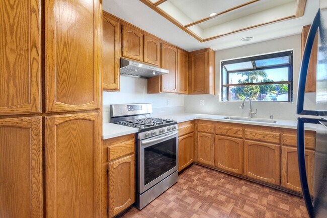 Building Photo - Corner Lot 4BR with Vaulted Ceilings & Big Yard