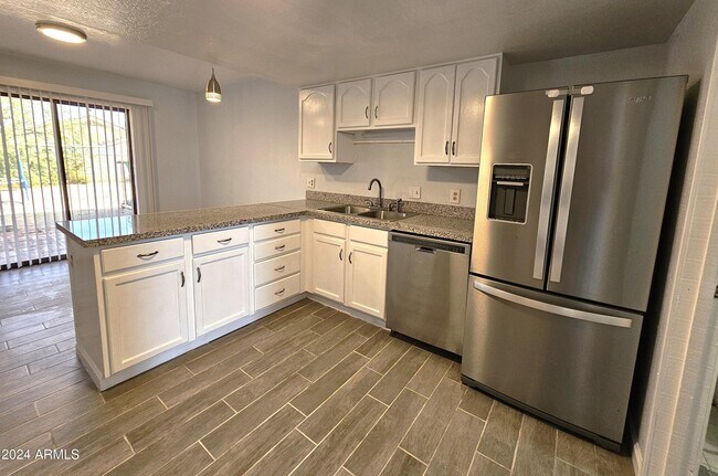 Building Photo - 8220 W Monaco Blvd