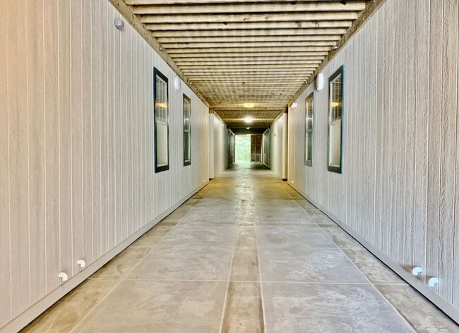 Building Photo - 2 Bedroom Condo w/Open Floor-Plan & Stainless Steel Appliances! Some Utilities Included!