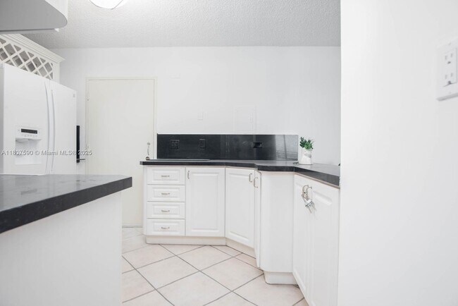 Building Photo - 5555 Collins Ave