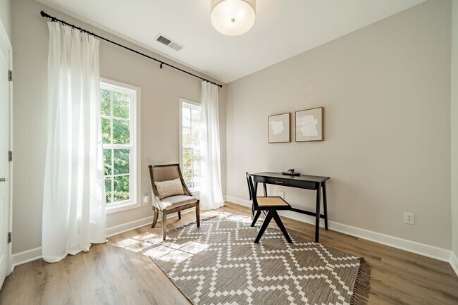 Building Photo - UPGRADES! Two Bedroom Townhouse - Six Mont...