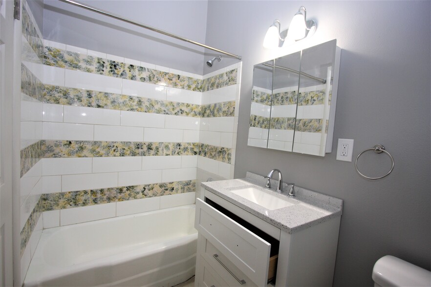 Tiled Shower and new bathroom vanity plus medicine cabinet storage - 5442 -5448 SE Franklin St