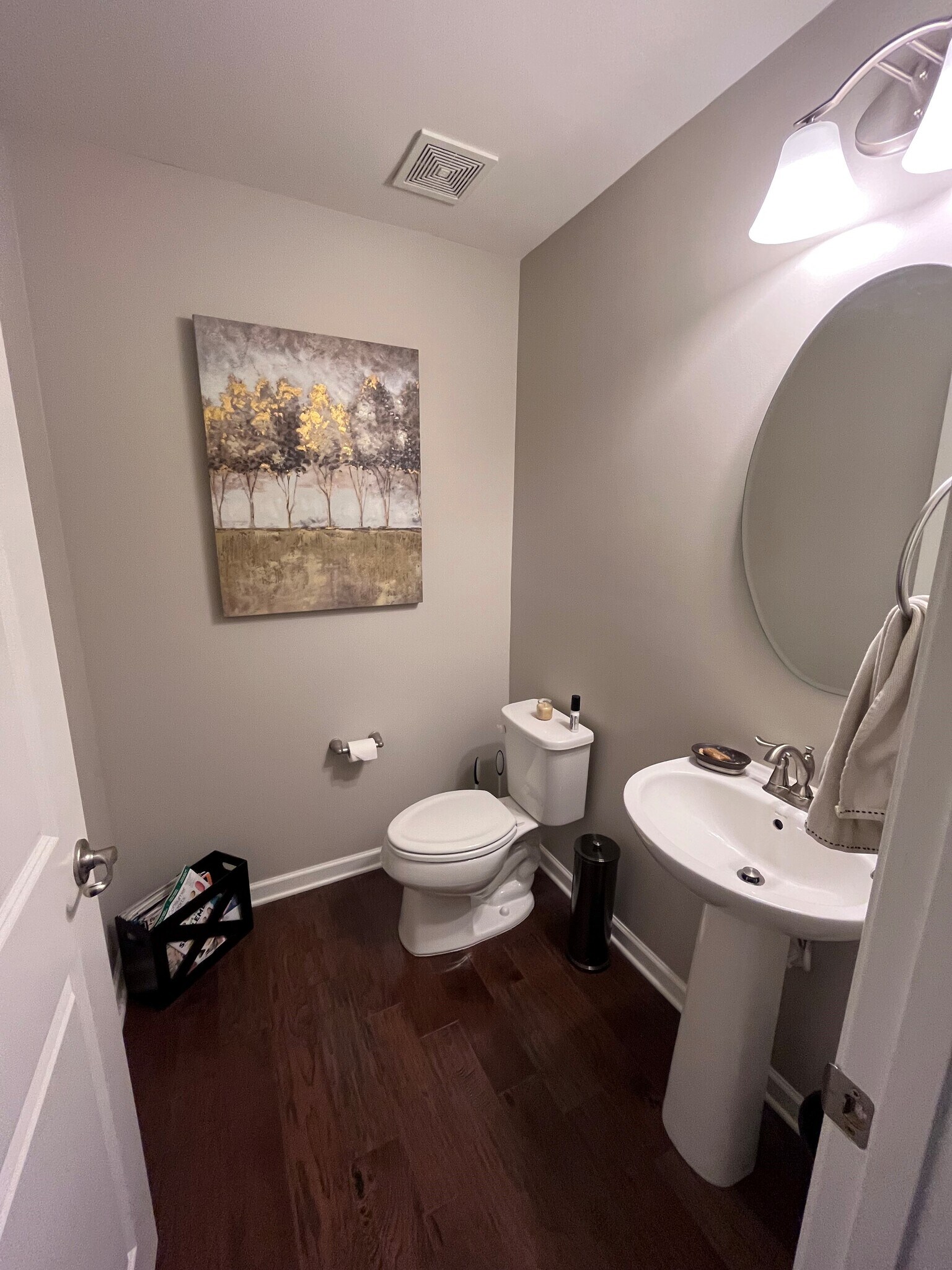 Half bath conveniently located downstairs for easy access to the main living areas. - 7736 Tranquil Trl