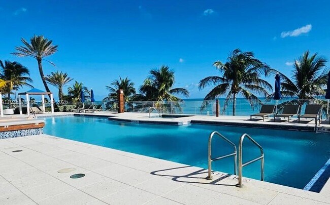 Building Photo - 18911 Collins Ave