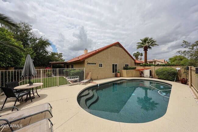Building Photo - 9085 E Windrose Dr
