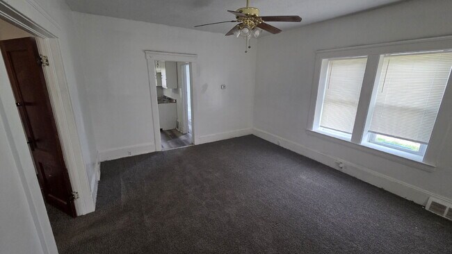 Building Photo - Spacious 1-Bed Duplex with French Doors to Master Bedroom