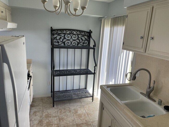 Building Photo - Coming Soon! Charming Corner Unit in Stallion Springs