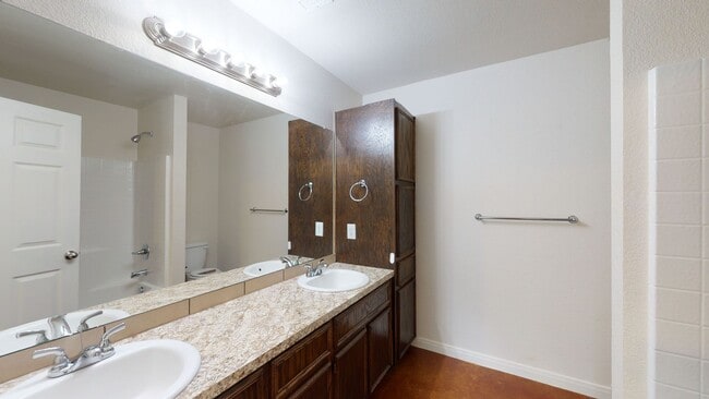 Building Photo - ALL STAINED CONCRETE FLOORING DUPLEX IN HA...