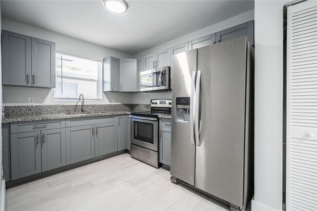 Building Photo - 465 NE 59th St