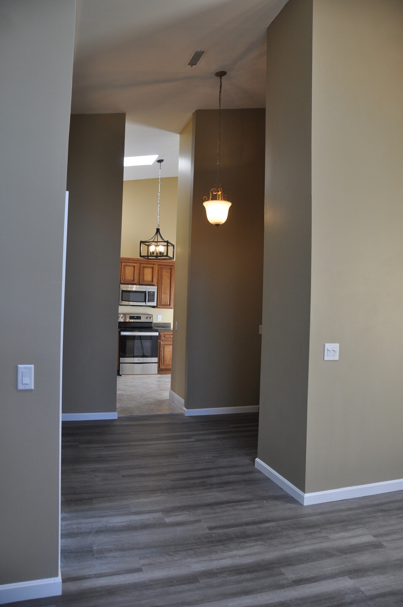 View from living room to kitchen - 181 Littleton Rd