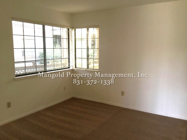 Building Photo - Spacious 2-Bed, 2-Bath Condo with Fireplac...