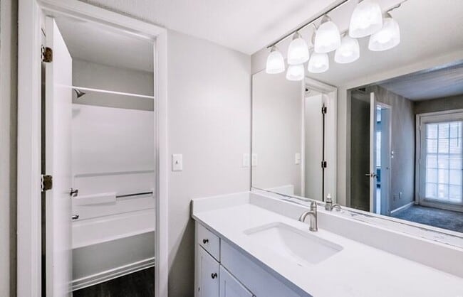 Building Photo - Spacious 2-Bedroom Elite Apartment with Private Balconies & Washer/Dryer