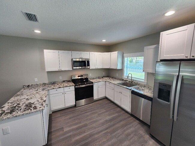 Building Photo - Brand New 2 Story Edgewater Duplex