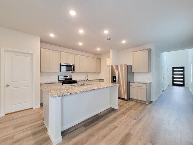 Building Photo - Welcome Home! Your never-lived-in sanctuary awaits your arrival. Have a large household? This 5-b...