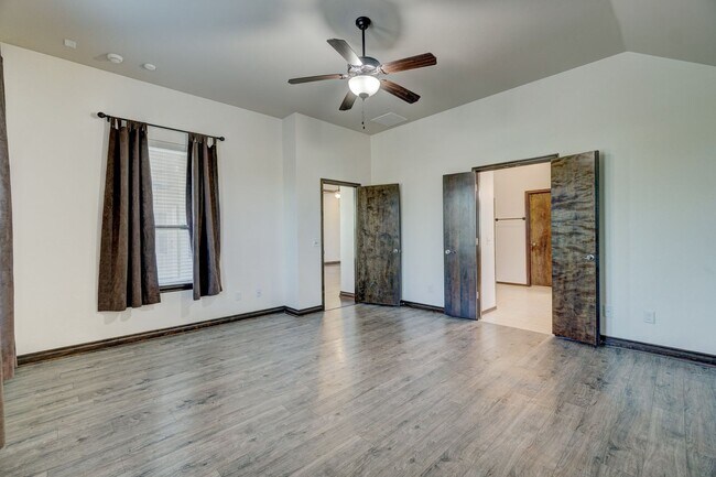 Building Photo - Stunning 4-Bedroom Home with Fireplace, Island Kitchen, 3-Car Garage & Large Backyard!