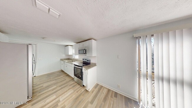 Building Photo - 5246 Devron Dr