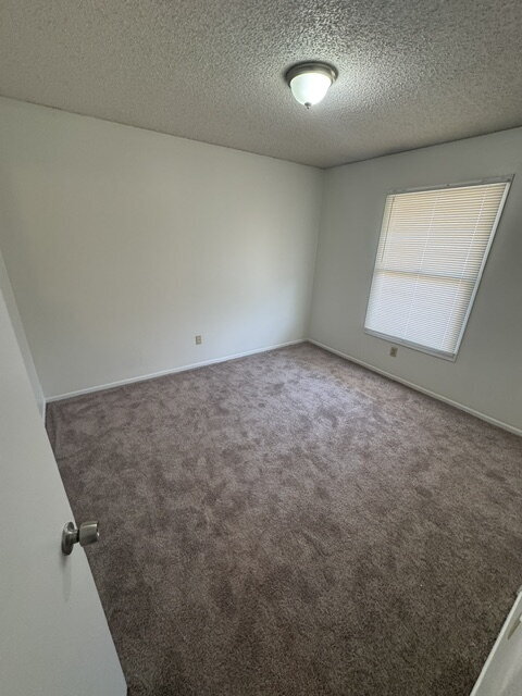 Building Photo - Come see this cozy 2 Bedroom, 1 Bathroom Upstairs Apartment!