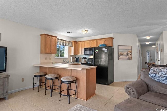 Building Photo - Ground floor, 2 bedroom, 2 bath- 10 mins to Surfside Beach.