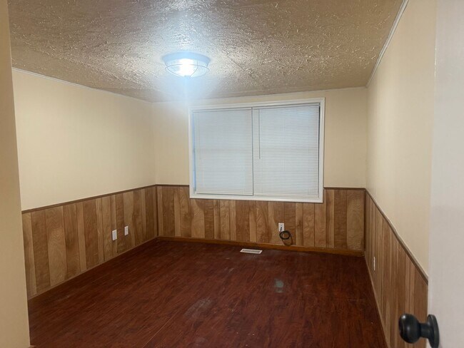 Building Photo - Step into this beautifully updated 1950's gem, where charm meets modern convenience