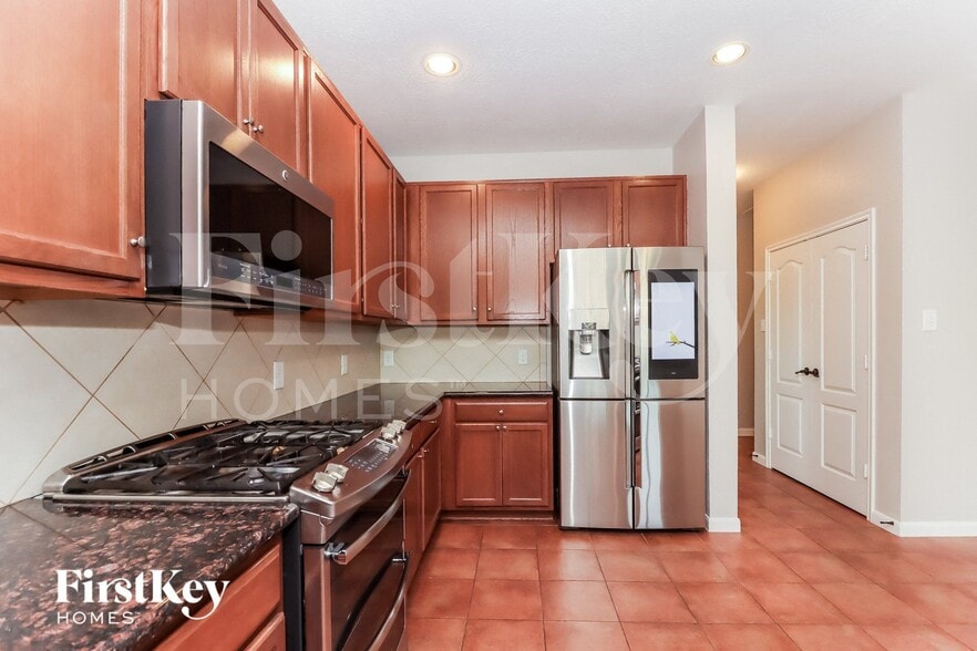 Building Photo - 16302 Stable Manor Ln