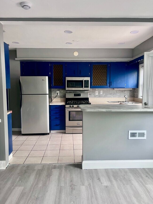 Building Photo - Updated 4-Bedroom Gem with Backyard Retreat