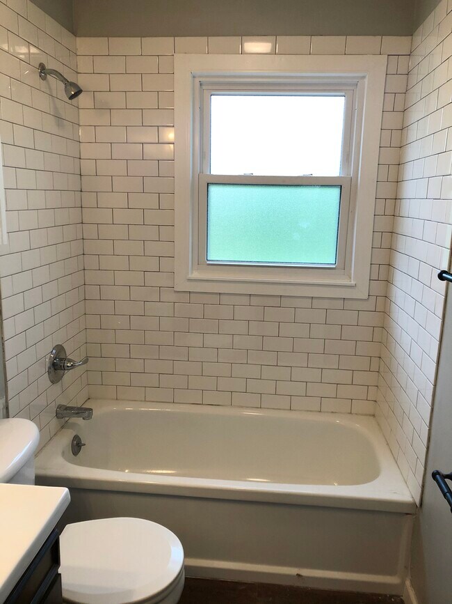 updated bath- new tile & windows - 1824 Miller Dr