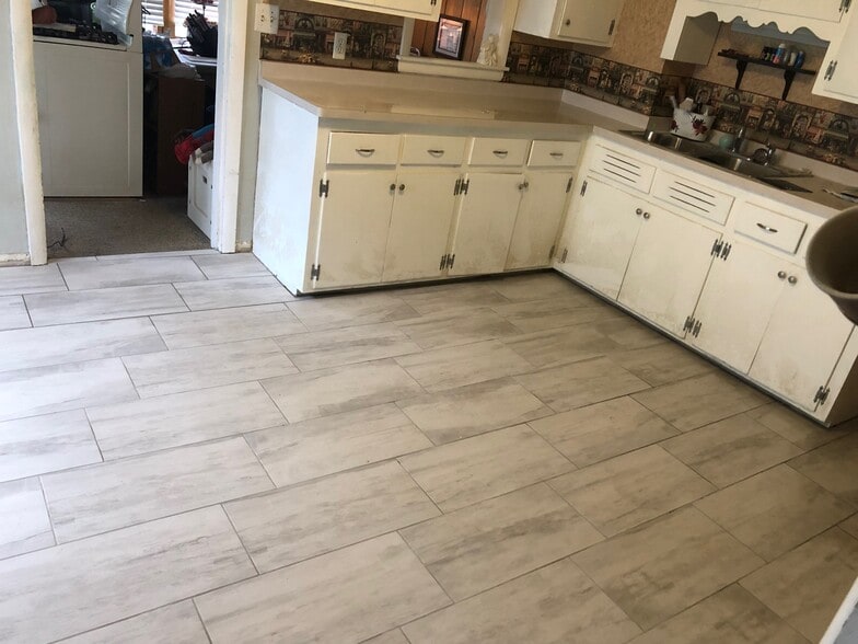 kitchen with tile floors - 717 N Highland Ave