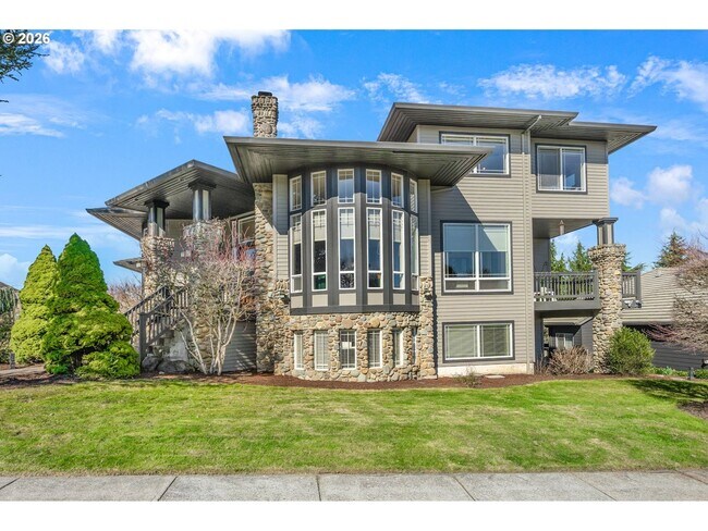 Building Photo - Stunning 5-Bedroom Bull Mountain Estate with Dual Living, Chef's Kitchen & 4-Car Garage