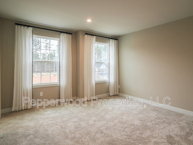 Building Photo - 7204 Red Cedar Trl