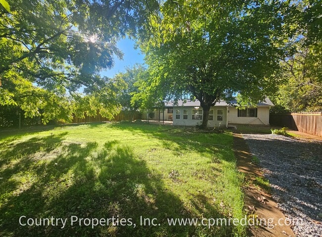 Building Photo - Price Reduced! Spacious House with Landsca...