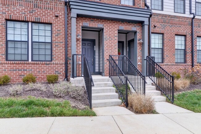 Building Photo - Three Story Brick End Unit with Rooftop Terrace