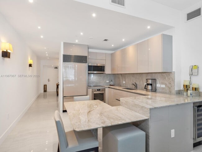 Building Photo - 6799 Collins Ave