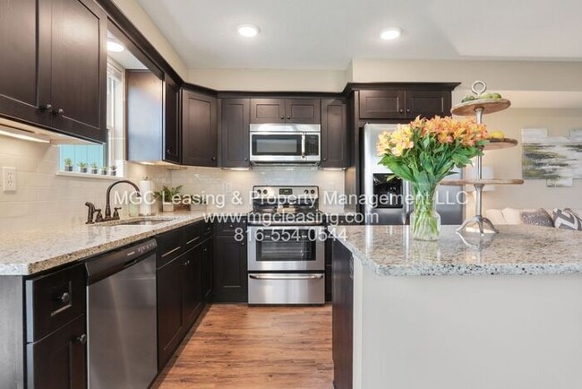 Building Photo - Serrano Townhomes with walk out finished b...