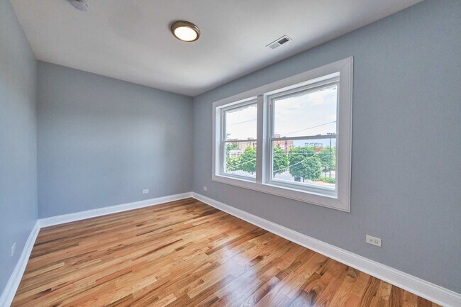 Building Photo - 6345 S Artesian Ave