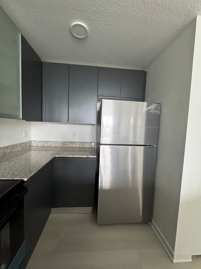 Building Photo - Cozy condo for Lease