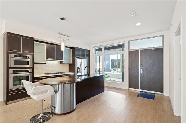 Building Photo - Resort Style Amenities in a Luxury, Modern 2 Bedroom Condo