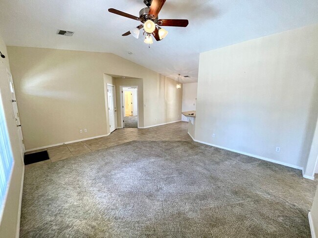 Building Photo - Inviting 3 Bedroom Home with RV Parking an...