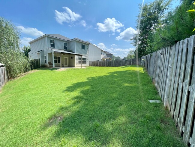 Building Photo - Whispering Pines 4 Bedroom 3.5 Bathroom Re...