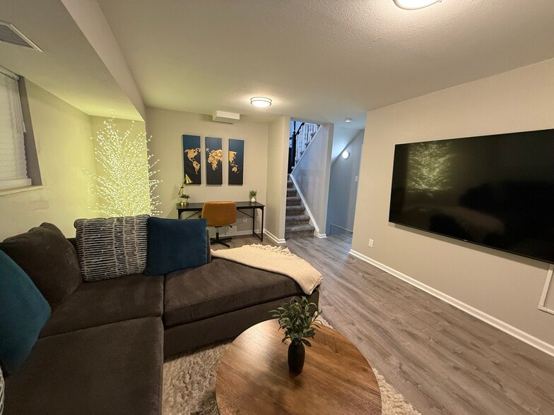 Livingroom-lower with TV - 5916 Newcombe Ct