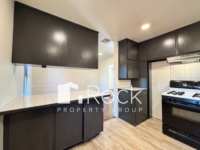 Building Photo - Charming Home with Real Wood Floors and Covered Parking ~ Offering 1 Month FREE Rent~