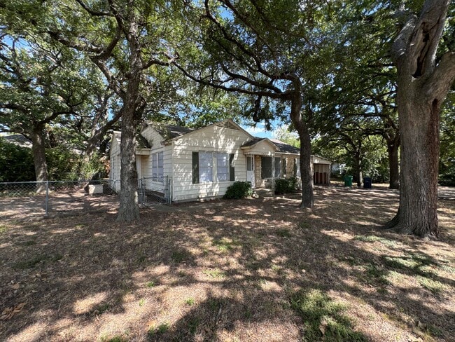 Building Photo - Denton Charmer with Big Yard, Carport & Flexible Living Space