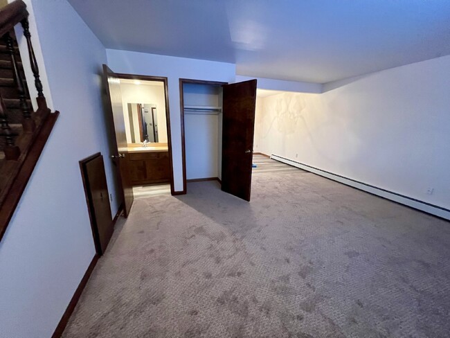 Building Photo - "Cozy 2-Bed Condo with Fireplace Oasis in ...